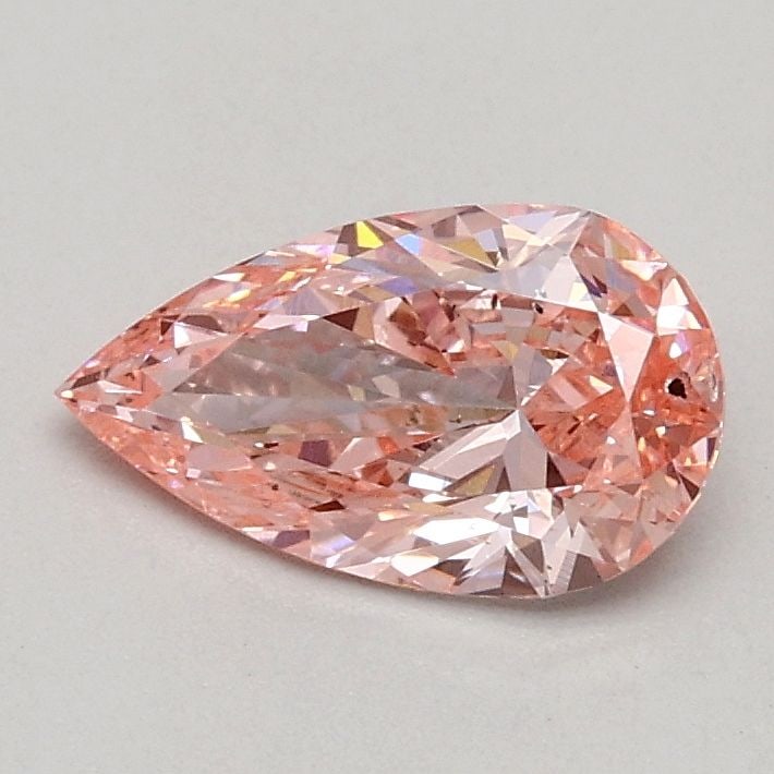 Loose Diamond - PEAR 0.52ct Fancy Vivid Pink SI1: Loose Diamond - PEAR 0.52ct Fancy Vivid Pink SI1 Source: This is a real non-mined Diamond that has been grown in a lab Shape: PEAR Carats: 0.52 Color: Fancy Vivid Pink Certification: IGI Video: