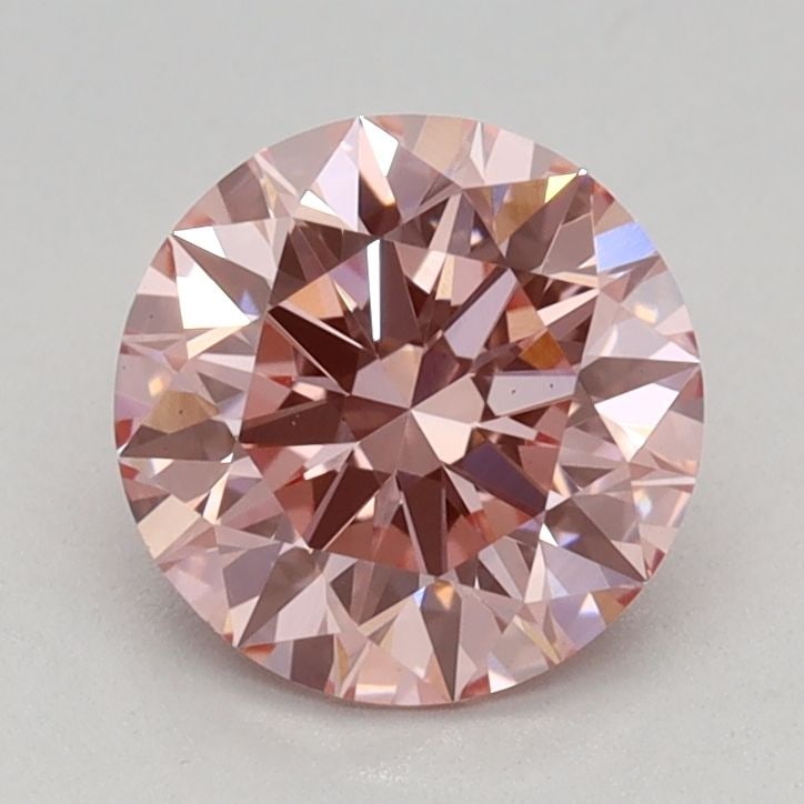 Ideal Loose Diamond - ROUND 0.94ct Fancy Vivid Pink VS1: Ideal Loose Diamond - ROUND 0.94ct Fancy Vivid Pink VS1 Source: This is a real non-mined Diamond that has been grown in a lab Shape: ROUND Carats: 0.94 Color: Fancy Vivid Pink Certification: IGI Video