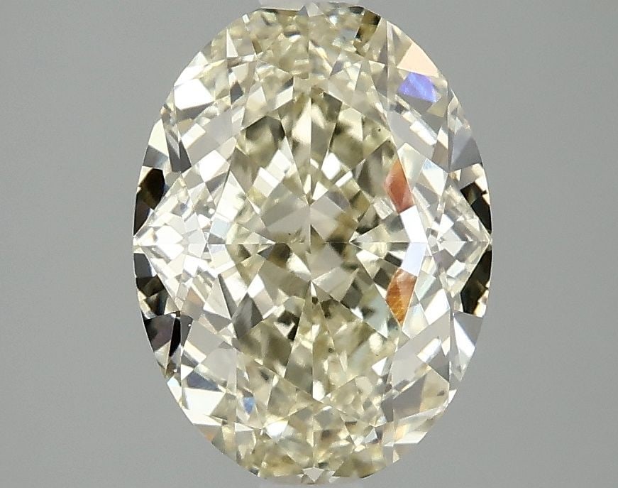 Loose Diamond - OVAL 2.94ct Fancy Yellow VS1: Loose Diamond - OVAL 2.94ct Fancy Yellow VS1 Source: This is a real non-mined Diamond that has been grown in a lab Shape: OVAL Carats: 2.94 Color: Fancy Yellow Certification: IGI Video: