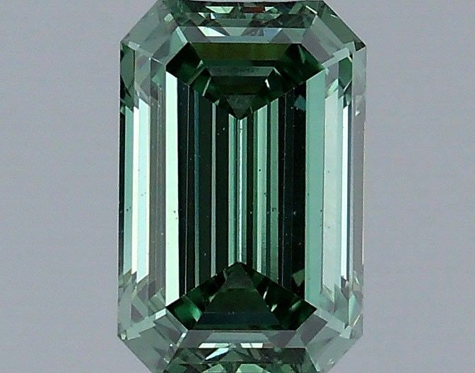 Loose Diamond - EMERALD 1.04ct Fancy Vivid Green VS2: Loose Diamond - EMERALD 1.04ct Fancy Vivid Green VS2 Source: This is a real non-mined Diamond that has been grown in a lab Shape: EMERALD Carats: 1.04 Color: Fancy Vivid Green Certification: IGI Video