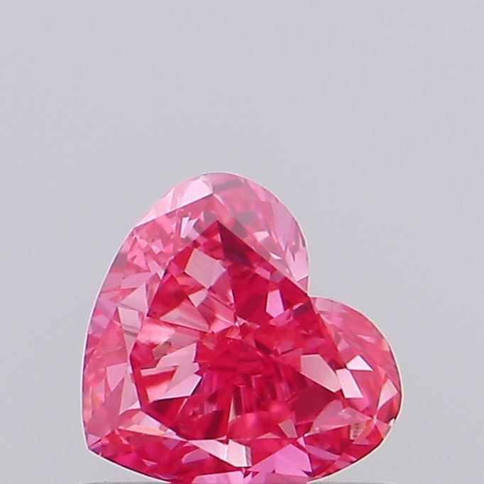 Loose Diamond - HEART 0.6ct Fancy Vivid Pink VVS2: Loose Diamond - HEART 0.6ct Fancy Vivid Pink VVS2 Source: This is a real non-mined Diamond that has been grown in a lab Shape: HEART Carats: 0.6 Color: Fancy Vivid Pink Certification: IGI Video: