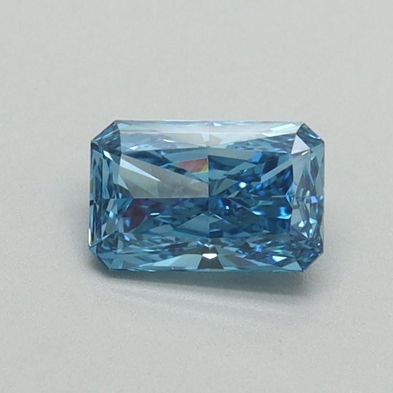 Loose Diamond - RADIANT 0.58ct Fancy Vivid Blue VVS2: Loose Diamond - RADIANT 0.58ct Fancy Vivid Blue VVS2 Source: This is a real non-mined Diamond that has been grown in a lab Shape: RADIANT Carats: 0.58 Color: Fancy Vivid Blue Certification: IGI Video: