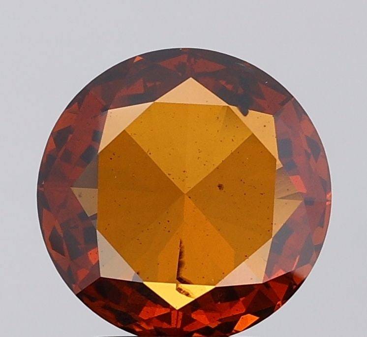 Loose Diamond - ROUND 2.47ct Fancy Deep Orange SI2: Loose Diamond - ROUND 2.47ct Fancy Deep Orange SI2 Source: This is a real non-mined Diamond that has been grown in a lab Shape: ROUND Carats: 2.47 Color: Fancy Deep Orange Certification: IGI Video: