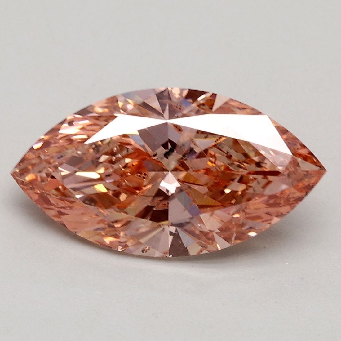 Loose Diamond - MARQUISE 2.02ct Fancy Pinkish Orange SI2: Loose Diamond - MARQUISE 2.02ct Fancy Pinkish Orange SI2 Source: This is a real non-mined Diamond that has been grown in a lab Shape: MARQUISE Carats: 2.02 Color: Fancy Pinkish Orange Certification: I