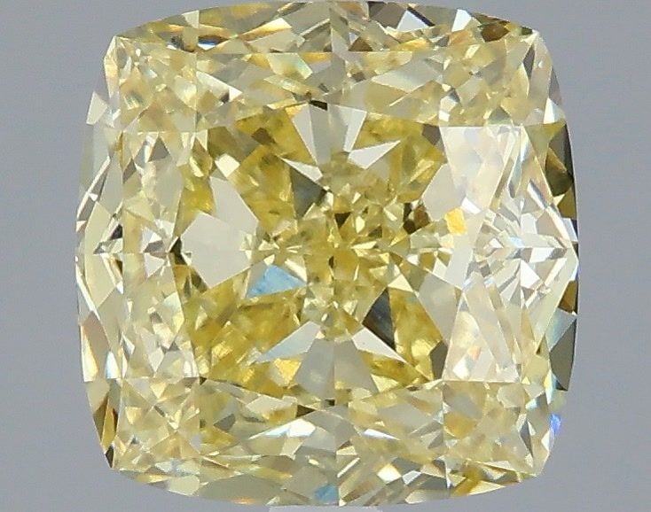 Loose Diamond - CUSHION MODIFIED 3.1ct Fancy Yellow VVS2: Loose Diamond - CUSHION MODIFIED 3.1ct Fancy Yellow VVS2 Source: This is a real non-mined Diamond that has been grown in a lab Shape: CUSHION MODIFIED Carats: 3.1 Color: Fancy Yellow Certification: IG