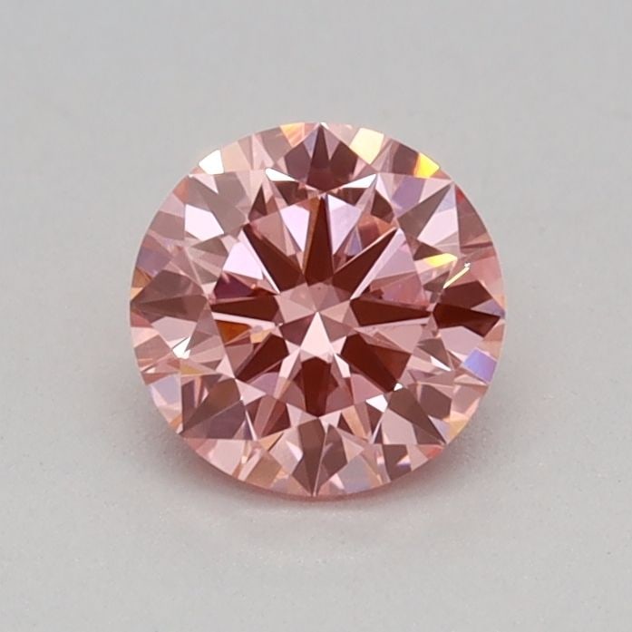 Loose Diamond - ROUND 0.32ct Fancy Vivid Pink VVS2: Loose Diamond - ROUND 0.32ct Fancy Vivid Pink VVS2 Source: This is a real non-mined Diamond that has been grown in a lab Shape: ROUND Carats: 0.32 Color: Fancy Vivid Pink Certification: IGI Video: