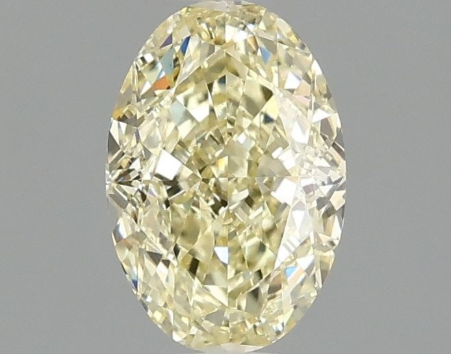 Loose Diamond - OVAL 1.1ct Fancy Yellow VS1: Loose Diamond - OVAL 1.1ct Fancy Yellow VS1 Source: This is a real non-mined Diamond that has been grown in a lab Shape: OVAL Carats: 1.1 Color: Fancy Yellow Certification: IGI Video: