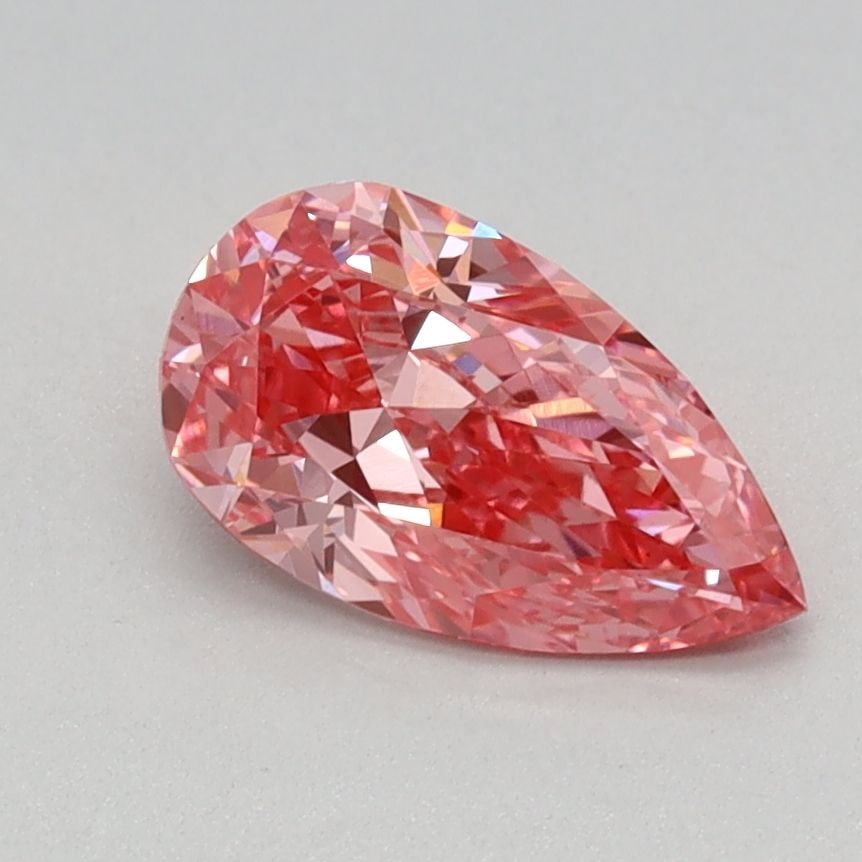 Loose Diamond - PEAR 0.73ct Fancy Vivid Pink VS1: Loose Diamond - PEAR 0.73ct Fancy Vivid Pink VS1 Source: This is a real non-mined Diamond that has been grown in a lab Shape: PEAR Carats: 0.73 Color: Fancy Vivid Pink Certification: IGI Video: