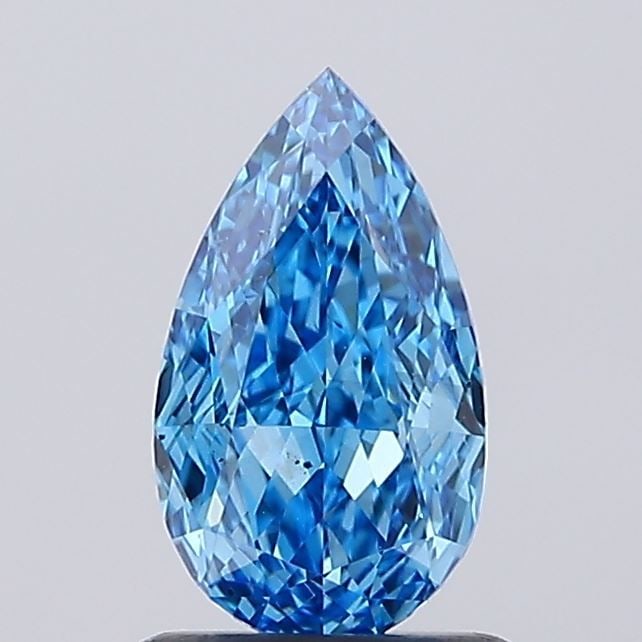 Loose Diamond - PEAR 0.94ct Fancy Vivid Blue VS2: Loose Diamond - PEAR 0.94ct Fancy Vivid Blue VS2 Source: This is a real non-mined Diamond that has been grown in a lab Shape: PEAR Carats: 0.94 Color: Fancy Vivid Blue Certification: IGI Video: