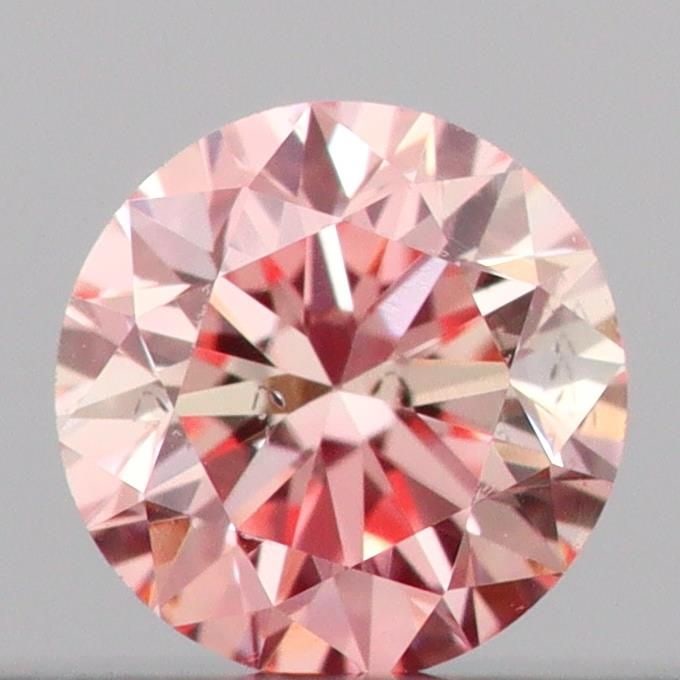 Loose Diamond - ROUND 0.14ct Fancy Intense Pink SI1: Loose Diamond - ROUND 0.14ct Fancy Intense Pink SI1 Source: This is a real non-mined Diamond that has been grown in a lab Shape: ROUND Carats: 0.14 Color: Fancy Intense Pink Certification: IGI Video: