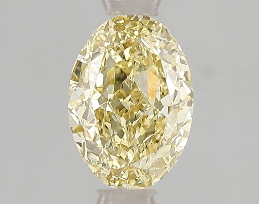 Loose Diamond - OVAL 1.5ct Fancy Intense Yellow VS2: Loose Diamond - OVAL 1.5ct Fancy Intense Yellow VS2 Source: This is a real non-mined Diamond that has been grown in a lab Shape: OVAL Carats: 1.5 Color: Fancy Intense Yellow Certification: IGI Video:
