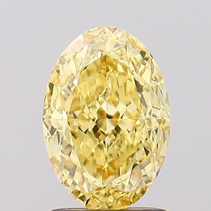 Loose Diamond - OVAL 1.75ct Fancy Vivid Yellow VS1: Loose Diamond - OVAL 1.75ct Fancy Vivid Yellow VS1 Source: This is a real non-mined Diamond that has been grown in a lab Shape: OVAL Carats: 1.75 Color: Fancy Vivid Yellow Certification: IGI Video: