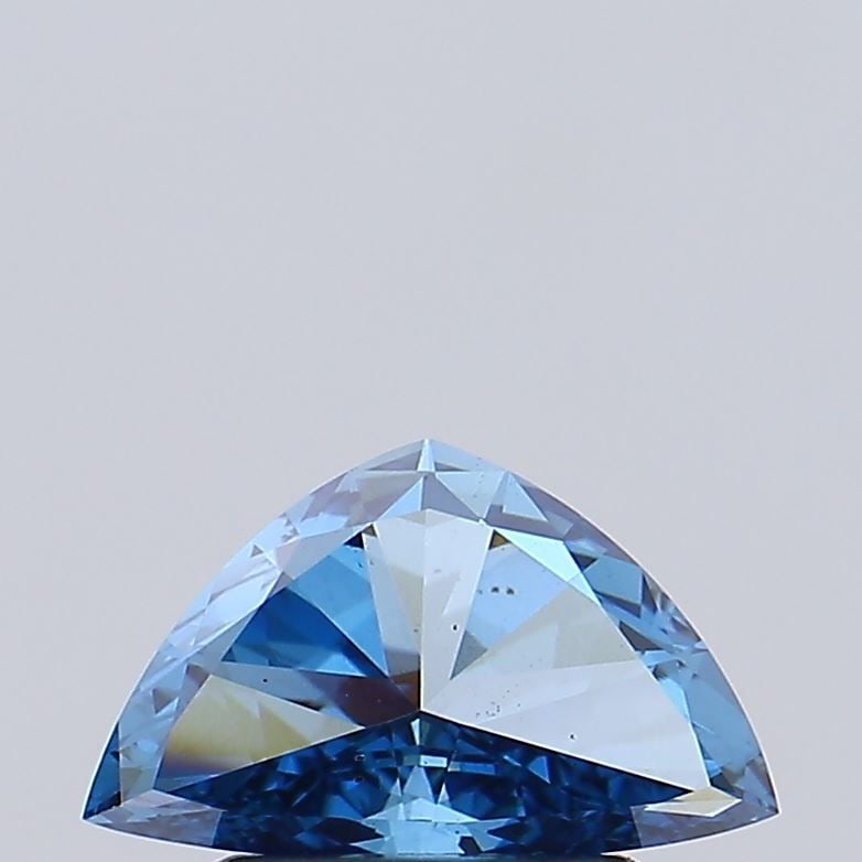 Loose Diamond - TRIANGULAR 0.7ct Fancy Vivid Blue VS2: Loose Diamond - TRIANGULAR 0.7ct Fancy Vivid Blue VS2 Source: This is a real non-mined Diamond that has been grown in a lab Shape: TRIANGULAR Carats: 0.7 Color: Fancy Vivid Blue Certification: NONE Vi