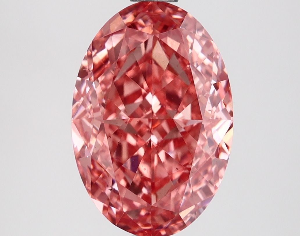 Loose Diamond - OVAL 2.65ct Fancy Vivid Pink VS2: Loose Diamond - OVAL 2.65ct Fancy Vivid Pink VS2 Source: This is a real non-mined Diamond that has been grown in a lab Shape: OVAL Carats: 2.65 Color: Fancy Vivid Pink Certification: IGI Video: