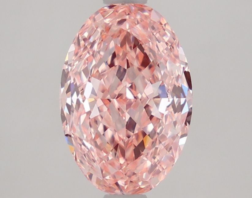 Loose Diamond - OVAL 2.1ct Fancy Vivid Pink VVS2: Loose Diamond - OVAL 2.1ct Fancy Vivid Pink VVS2 Source: This is a real non-mined Diamond that has been grown in a lab Shape: OVAL Carats: 2.1 Color: Fancy Vivid Pink Certification: IGI Video: