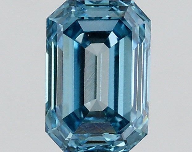 Loose Diamond - EMERALD 0.64ct Fancy Vivid Blue VS1: Loose Diamond - EMERALD 0.64ct Fancy Vivid Blue VS1 Source: This is a real non-mined Diamond that has been grown in a lab Shape: EMERALD Carats: 0.64 Color: Fancy Vivid Blue Certification: IGI Video: