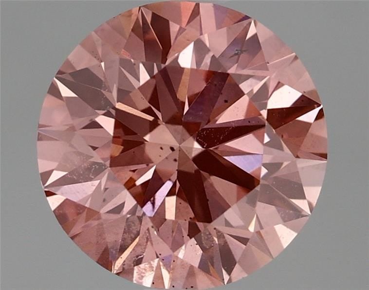 Ideal Loose Diamond - ROUND 1.85ct Fancy Vivid Purplish Pink SI1: Ideal Loose Diamond - ROUND 1.85ct Fancy Vivid Purplish Pink SI1 Source: This is a real non-mined Diamond that has been grown in a lab Shape: ROUND Carats: 1.85 Color: Fancy Vivid Purplish Pink