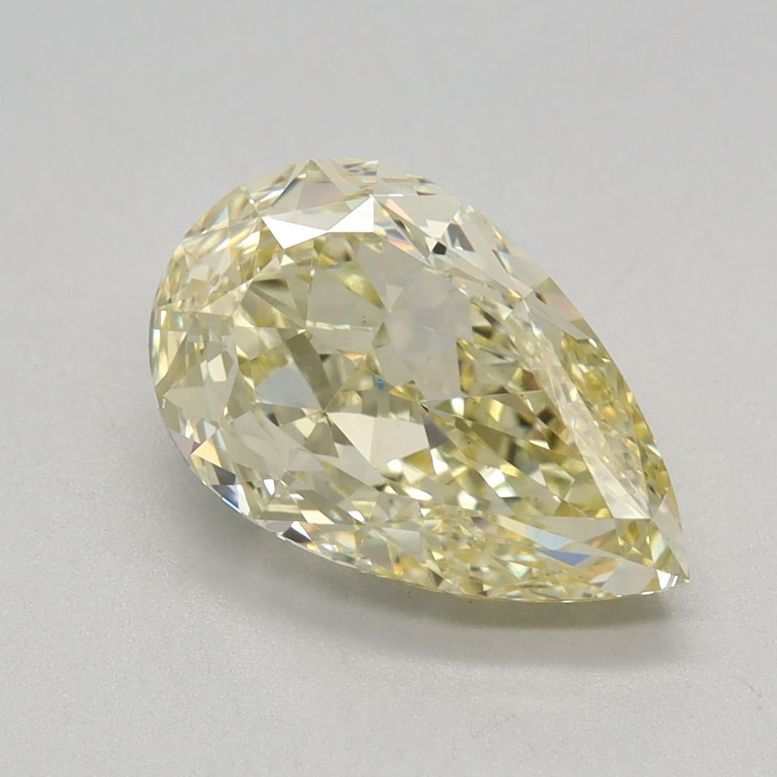 Loose Diamond - PEAR 2.18ct Fancy Yellow VS1: Loose Diamond - PEAR 2.18ct Fancy Yellow VS1 Source: This is a real non-mined Diamond that has been grown in a lab Shape: PEAR Carats: 2.18 Color: Fancy Yellow Certification: IGI Video: