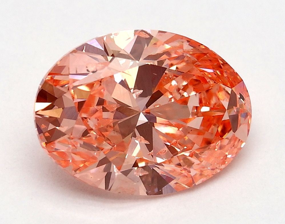 Loose Diamond - OVAL 2.0ct Fancy Vivid Pink SI2: Loose Diamond - OVAL 2.0ct Fancy Vivid Pink SI2 Source: This is a real non-mined Diamond that has been grown in a lab Shape: OVAL Carats: 2.0 Color: Fancy Vivid Pink Certification: IGI Video:
