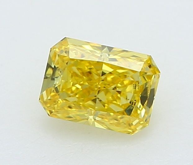 Loose Diamond - RADIANT 0.24ct Fancy Vivid Yellow VS1: Loose Diamond - RADIANT 0.24ct Fancy Vivid Yellow VS1 Source: This is a real non-mined Diamond that has been grown in a lab Shape: RADIANT Carats: 0.24 Color: Fancy Vivid Yellow Certification: IGI Vid