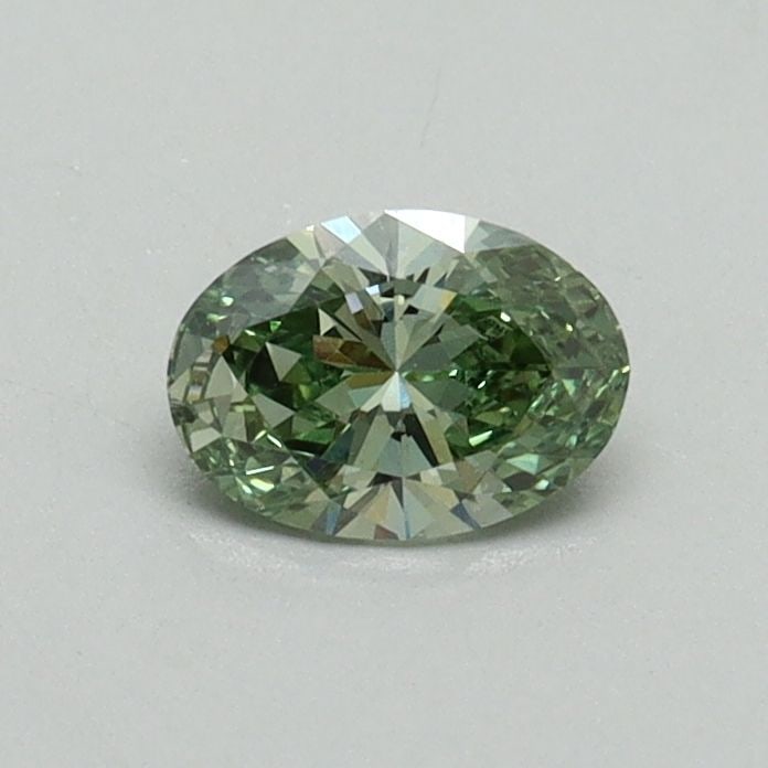 Loose Diamond - OVAL 0.34ct Fancy Vivid Green VVS2: Loose Diamond - OVAL 0.34ct Fancy Vivid Green VVS2 Source: This is a real non-mined Diamond that has been grown in a lab Shape: OVAL Carats: 0.34 Color: Fancy Vivid Green Certification: IGI Video: