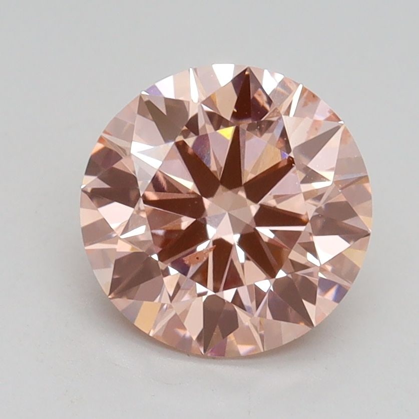 Loose Diamond - ROUND 1.71ct Fancy Intense Pink SI1: Loose Diamond - ROUND 1.71ct Fancy Intense Pink SI1 Source: This is a real non-mined Diamond that has been grown in a lab Shape: ROUND Carats: 1.71 Color: Fancy Intense Pink Certification: IGI Video: