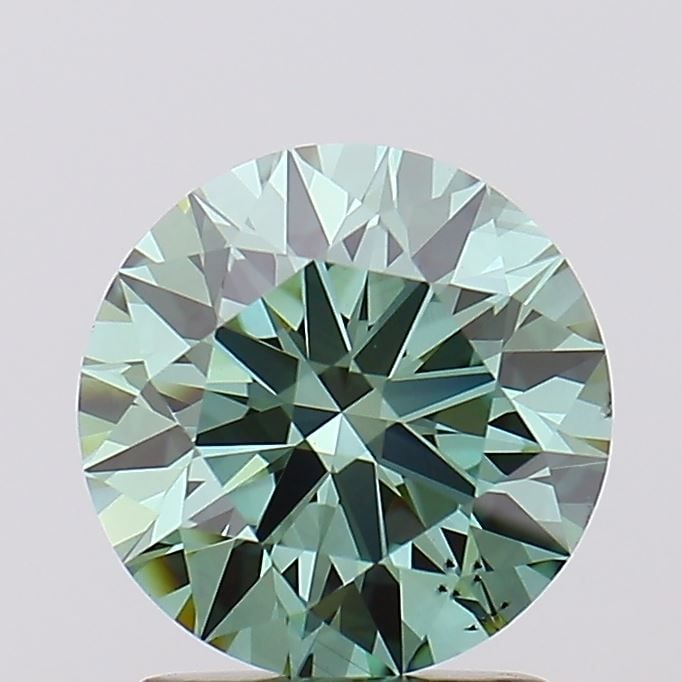 Ideal Loose Diamond - ROUND 1.8ct Fancy Vivid Green VS2: Ideal Loose Diamond - ROUND 1.8ct Fancy Vivid Green VS2 Source: This is a real non-mined Diamond that has been grown in a lab Shape: ROUND Carats: 1.8 Color: Fancy Vivid Green Certification: IGI Video