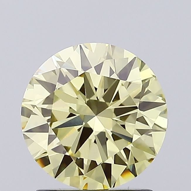 Loose Diamond - ROUND 1.52ct Fancy Yellow VS1: Loose Diamond - ROUND 1.52ct Fancy Yellow VS1 Source: This is a real non-mined Diamond that has been grown in a lab Shape: ROUND Carats: 1.52 Color: Fancy Yellow Certification: IGI Video: