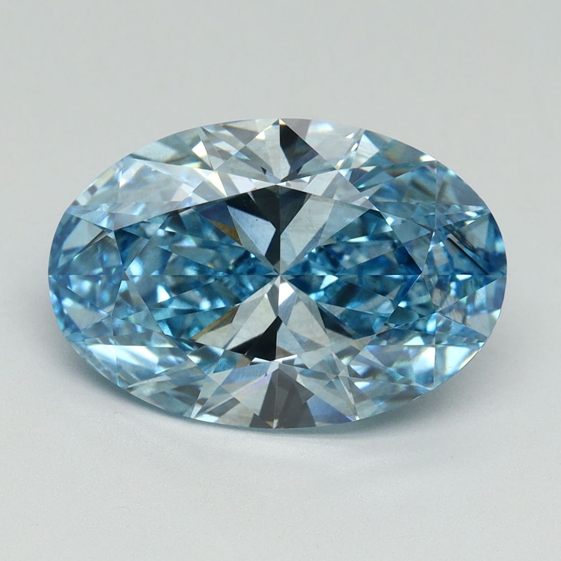 Loose Diamond - OVAL 5.11ct Fancy Vivid Blue VS2: Loose Diamond - OVAL 5.11ct Fancy Vivid Blue VS2 Source: This is a real non-mined Diamond that has been grown in a lab Shape: OVAL Carats: 5.11 Color: Fancy Vivid Blue Certification: IGI Video: