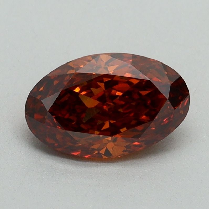 Loose Diamond - OVAL 1.06ct Fancy Vivid Orange VVS2: Loose Diamond - OVAL 1.06ct Fancy Vivid Orange VVS2 Source: This is a real non-mined Diamond that has been grown in a lab Shape: OVAL Carats: 1.06 Color: Fancy Vivid Orange Certification: IGI Video: