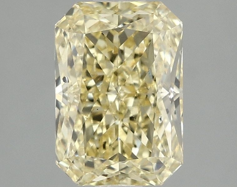 Loose Diamond - RADIANT 2.08ct Fancy Vivid Yellow SI1: Loose Diamond - RADIANT 2.08ct Fancy Vivid Yellow SI1 Source: This is a real non-mined Diamond that has been grown in a lab Shape: RADIANT Carats: 2.08 Color: Fancy Vivid Yellow Certification: IGI Vid