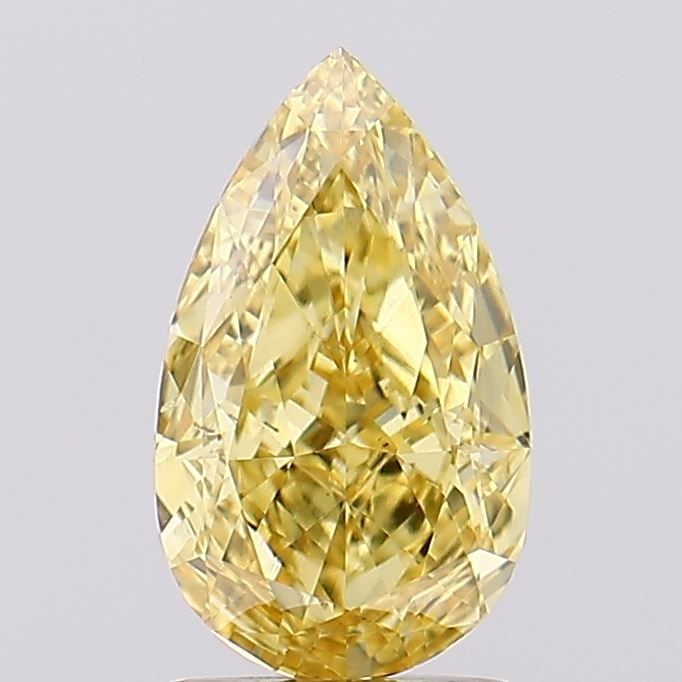 Loose Diamond - PEAR 1.82ct Fancy Vivid Yellow VS1: Loose Diamond - PEAR 1.82ct Fancy Vivid Yellow VS1 Source: This is a real non-mined Diamond that has been grown in a lab Shape: PEAR Carats: 1.82 Color: Fancy Vivid Yellow Certification: IGI Video:
