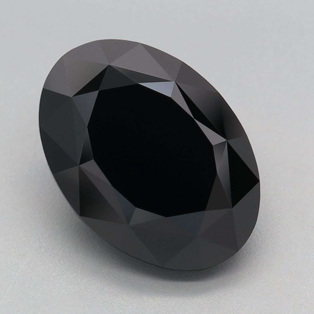 Loose Diamond - OVAL 3.12ct Fancy Black: Loose Diamond - OVAL 3.12ct Fancy Black Source: This is a real non-mined Diamond that has been grown in a lab Shape: OVAL Carats: 3.12 Color: Fancy Black Certification: IGI Video: