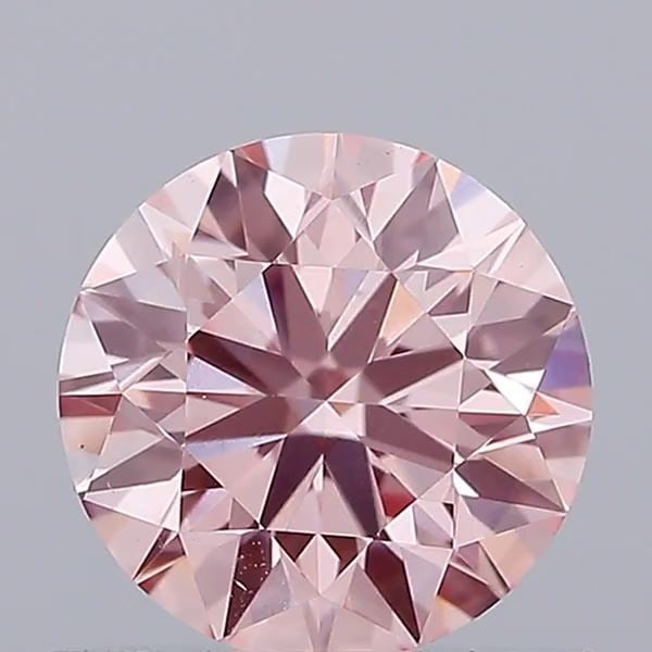 Ideal Loose Diamond - ROUND 0.7ct Fancy Intense Pink VS1: Ideal Loose Diamond - ROUND 0.7ct Fancy Intense Pink VS1 Source: This is a real non-mined Diamond that has been grown in a lab Shape: ROUND Carats: 0.7 Color: Fancy Intense Pink Certification: IGI Vid