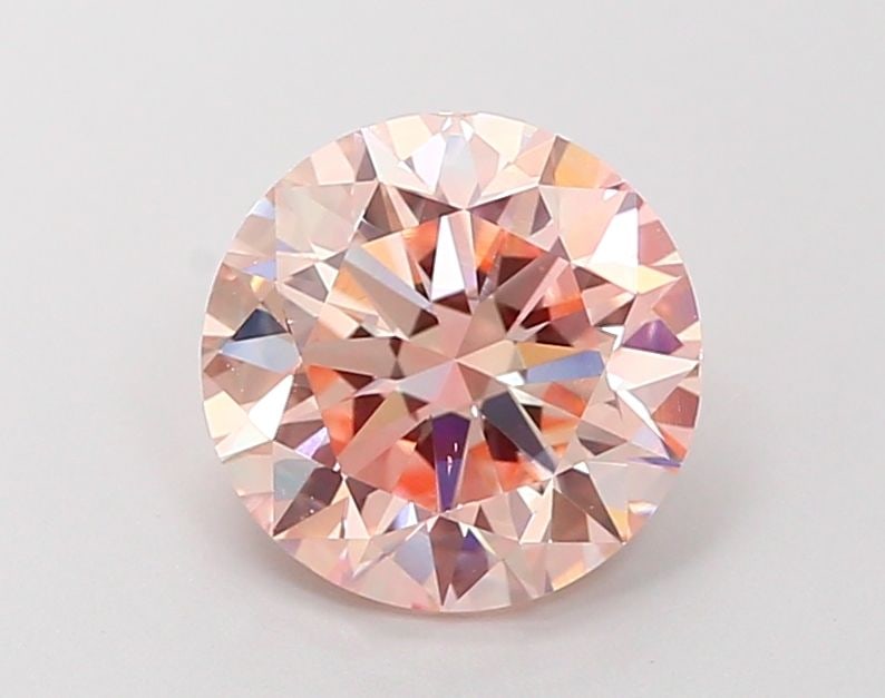 Loose Diamond - ROUND 1.93ct Fancy Intense Pink VS1: Loose Diamond - ROUND 1.93ct Fancy Intense Pink VS1 Source: This is a real non-mined Diamond that has been grown in a lab Shape: ROUND Carats: 1.93 Color: Fancy Intense Pink Certification: IGI Video: