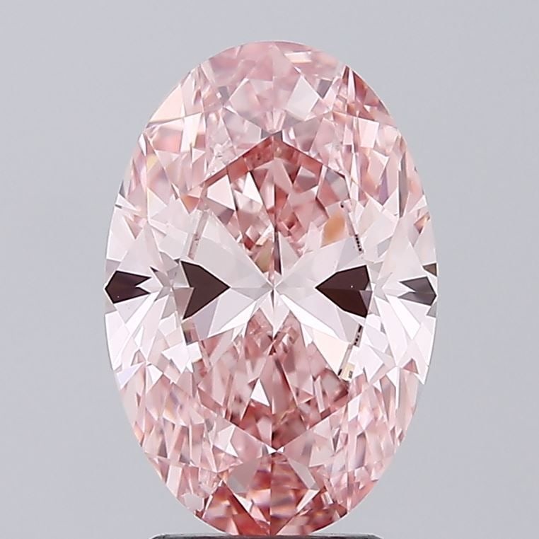 Loose Diamond - OVAL 3.41ct Fancy Vivid Pink VS1: Loose Diamond - OVAL 3.41ct Fancy Vivid Pink VS1 Source: This is a real non-mined Diamond that has been grown in a lab Shape: OVAL Carats: 3.41 Color: Fancy Vivid Pink Certification: IGI Video: