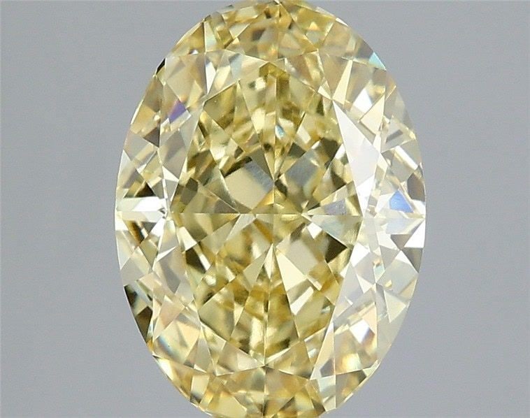 Loose Diamond - OVAL 3.08ct Fancy Yellow VVS2: Loose Diamond - OVAL 3.08ct Fancy Yellow VVS2 Source: This is a real non-mined Diamond that has been grown in a lab Shape: OVAL Carats: 3.08 Color: Fancy Yellow Certification: IGI Video: