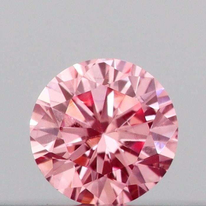 Loose Diamond - ROUND 0.09ct Fancy Vivid Pink VS1: Loose Diamond - ROUND 0.09ct Fancy Vivid Pink VS1 Source: This is a real non-mined Diamond that has been grown in a lab Shape: ROUND Carats: 0.09 Color: Fancy Vivid Pink Certification: IGI Video: