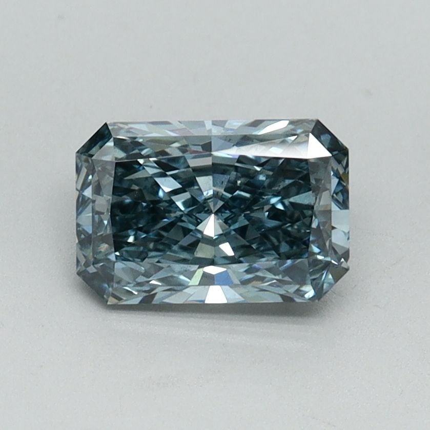 Loose Diamond - RADIANT 0.98ct Fancy Vivid Greenish Blue VS2: Loose Diamond - RADIANT 0.98ct Fancy Vivid Greenish Blue VS2 Source: This is a real non-mined Diamond that has been grown in a lab Shape: RADIANT Carats: 0.98 Color: Fancy Vivid Greenish Blue Certific