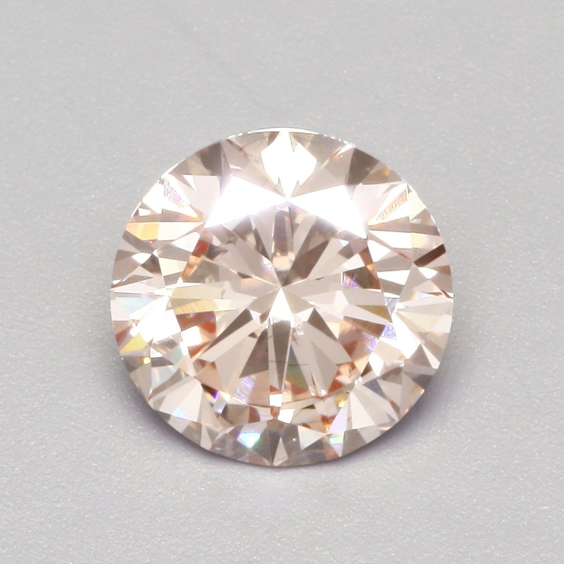 Loose Diamond - ROUND 1.57ct Fancy Intense Pink VS2: Loose Diamond - ROUND 1.57ct Fancy Intense Pink VS2 Source: This is a real non-mined Diamond that has been grown in a lab Shape: ROUND Carats: 1.57 Color: Fancy Intense Pink Certification: IGI Video: