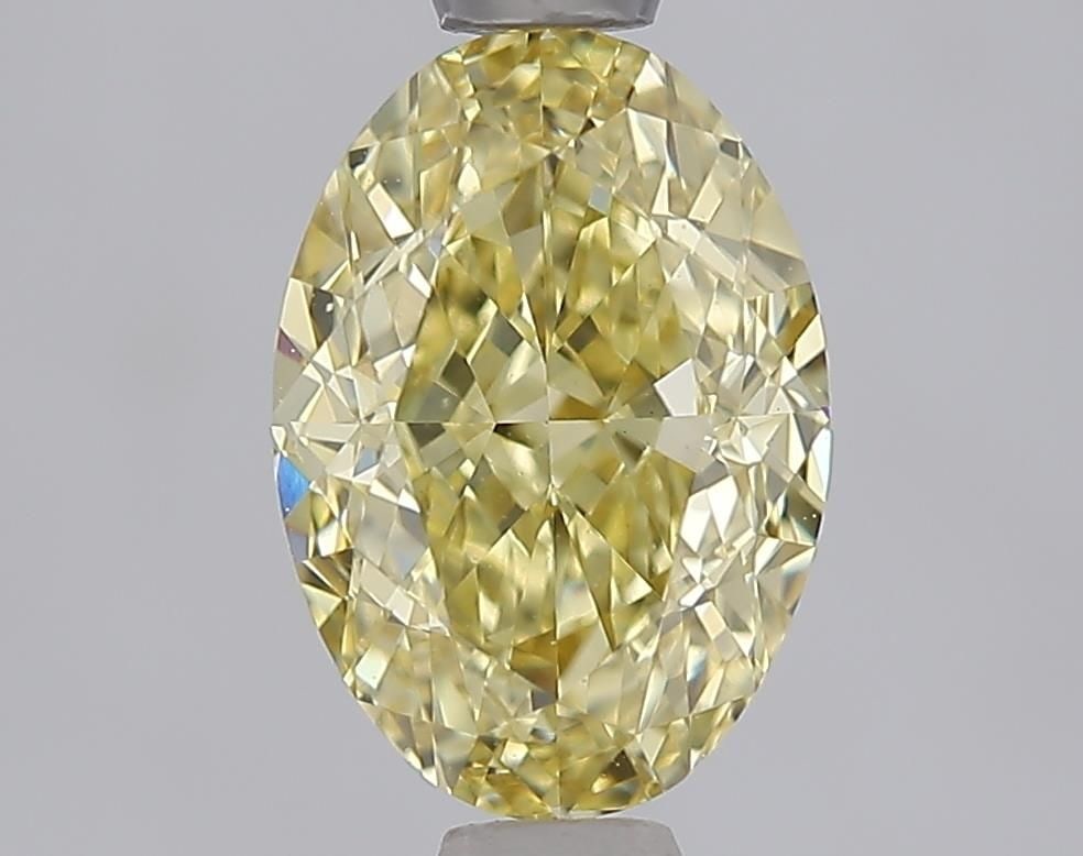 Loose Diamond - OVAL 1.54ct Fancy Yellow VVS2: Loose Diamond - OVAL 1.54ct Fancy Yellow VVS2 Source: This is a real non-mined Diamond that has been grown in a lab Shape: OVAL Carats: 1.54 Color: Fancy Yellow Certification: IGI Video: