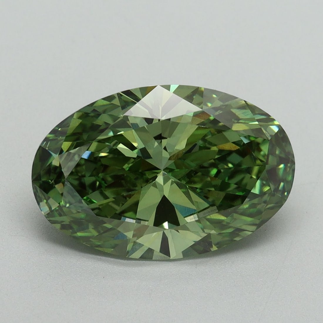 Loose Diamond - OVAL 4.14ct Fancy Vivid Green VS1: Loose Diamond - OVAL 4.14ct Fancy Vivid Green VS1 Source: This is a real non-mined Diamond that has been grown in a lab Shape: OVAL Carats: 4.14 Color: Fancy Vivid Green Certification: IGI Video:
