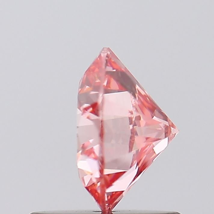 Loose Diamond - ROUND 0.91ct Fancy Intense Pink SI1: Loose Diamond - ROUND 0.91ct Fancy Intense Pink SI1 Source: This is a real non-mined Diamond that has been grown in a lab Shape: ROUND Carats: 0.91 Color: Fancy Intense Pink Certification: IGI Video: