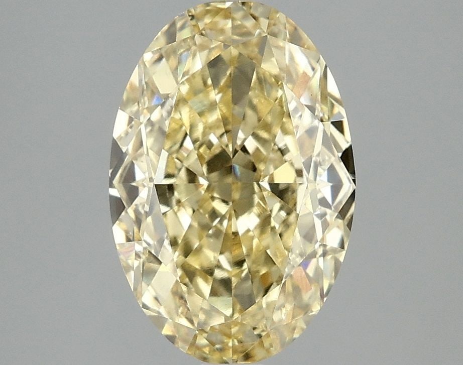 Loose Diamond - OVAL 3.1ct Fancy Vivid Yellow VS1: Loose Diamond - OVAL 3.1ct Fancy Vivid Yellow VS1 Source: This is a real non-mined Diamond that has been grown in a lab Shape: OVAL Carats: 3.1 Color: Fancy Vivid Yellow Certification: IGI Video:
