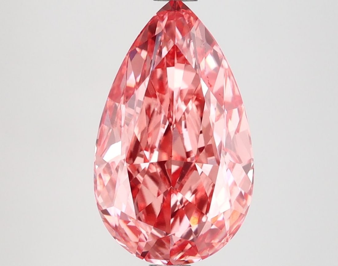 Loose Diamond - PEAR 3.01ct Fancy Vivid Pink VS1: Loose Diamond - PEAR 3.01ct Fancy Vivid Pink VS1 Source: This is a real non-mined Diamond that has been grown in a lab Shape: PEAR Carats: 3.01 Color: Fancy Vivid Pink Certification: IGI Video: