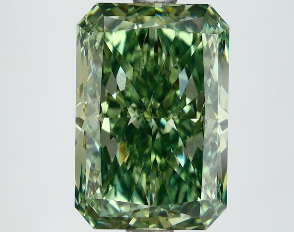 Loose Diamond - RADIANT 3.74ct Fancy Vivid Green VVS2: Loose Diamond - RADIANT 3.74ct Fancy Vivid Green VVS2 Source: This is a real non-mined Diamond that has been grown in a lab Shape: RADIANT Carats: 3.74 Color: Fancy Vivid Green Certification: IGI Vide