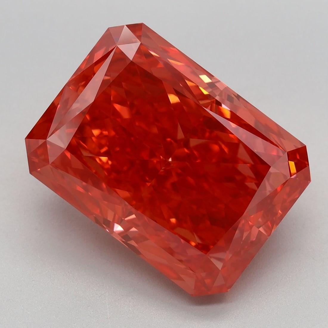Loose Diamond - RADIANT 7.41ct Fancy Vivid Orangey Pink VS1: Loose Diamond - RADIANT 7.41ct Fancy Vivid Orangey Pink VS1 Source: This is a real non-mined Diamond that has been grown in a lab Shape: RADIANT Carats: 7.41 Color: Fancy Vivid Orangey Pink Certificat