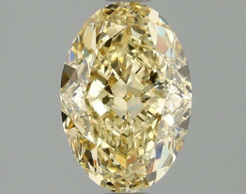 Loose Diamond - OVAL 2.1ct Fancy Intense Yellow VS1: Loose Diamond - OVAL 2.1ct Fancy Intense Yellow VS1 Source: This is a real non-mined Diamond that has been grown in a lab Shape: OVAL Carats: 2.1 Color: Fancy Intense Yellow Certification: IGI Video: