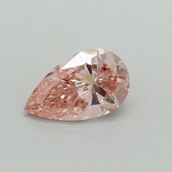 Loose Diamond - PEAR 0.31ct Fancy Vivid Pink VVS2: Loose Diamond - PEAR 0.31ct Fancy Vivid Pink VVS2 Source: This is a real non-mined Diamond that has been grown in a lab Shape: PEAR Carats: 0.31 Color: Fancy Vivid Pink Certification: IGI Video: