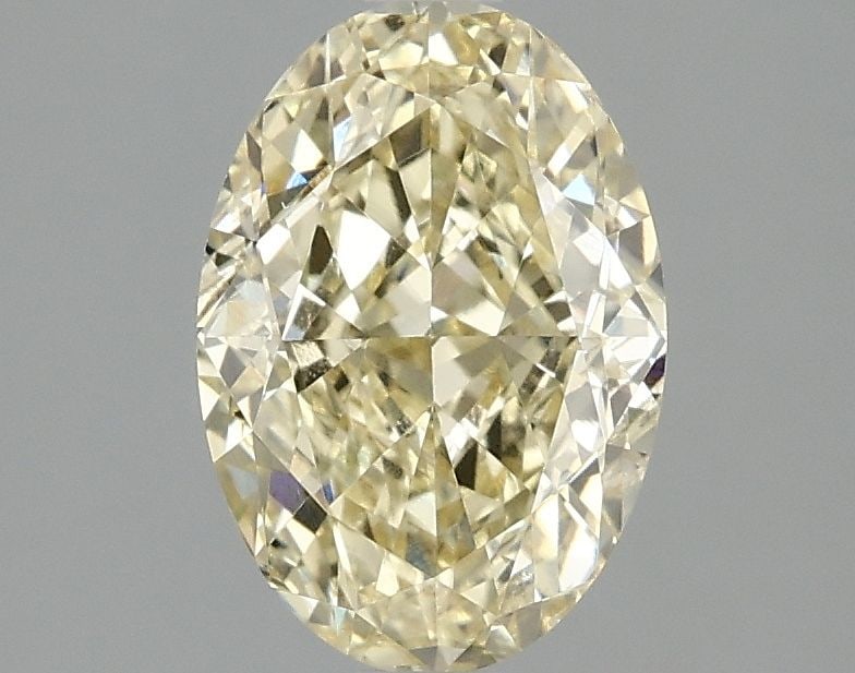 Loose Diamond - OVAL 2.06ct Fancy Intense Yellow VS2: Loose Diamond - OVAL 2.06ct Fancy Intense Yellow VS2 Source: This is a real non-mined Diamond that has been grown in a lab Shape: OVAL Carats: 2.06 Color: Fancy Intense Yellow Certification: IGI Video